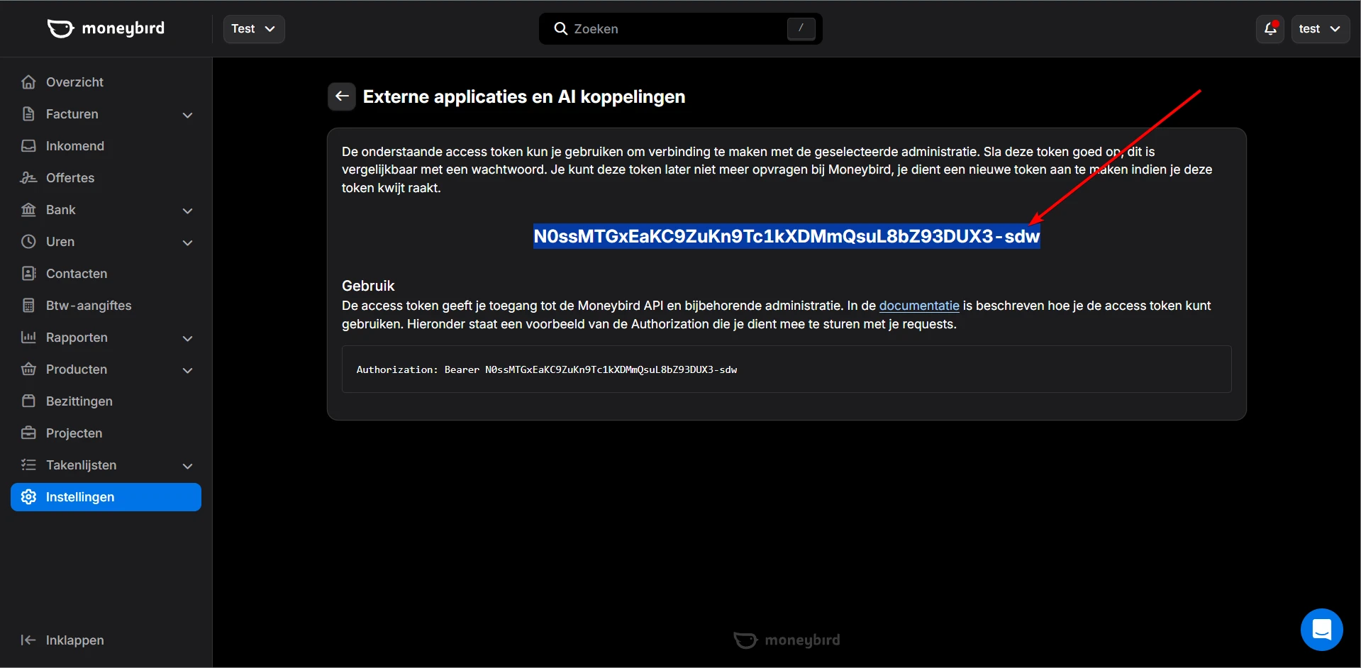 Het aangemaakte API-token, eenmalig zichtbaar met een knop om het te kopiëren.